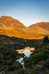 landscape with mountains reflected in a lake