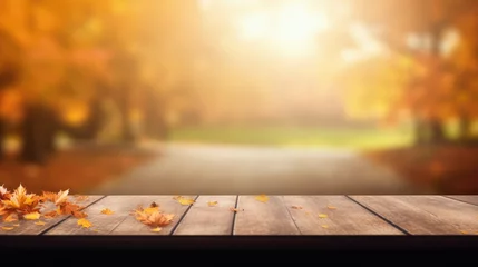 Fototapeten Empty blank wooden table fall background with autumn trees orange yellow color leaves backdrop forest or park nature scene abstract blurred bokeh tabletop for product display desk mockup. Copy space . © Synthetica