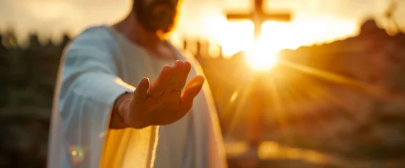 Fotobehang Easter religion,Jesus reaching out his hand against dark background Resurrected Jesus Christ reaching out hand and praying. © shintartanya