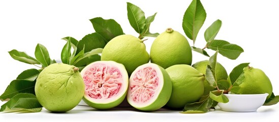 A plate of fresh green grapefruit with leaves, a staple food rich in vitamins and antioxidants. Great ingredient for superfood recipes