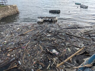 Dirty Beach full of plastic garbage 