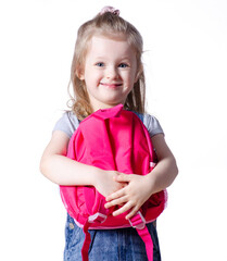 Girl child with backpack in hands looking smiling on white background isolation. Childhood, education, products children