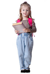 Girl child with backpack and books smiling looking on white background isolation. Childhood, education, products children