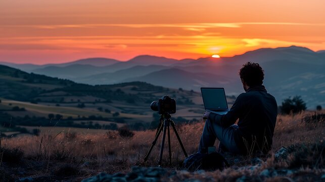 nomad Digital mountain landscape at sunset with laptop and camera