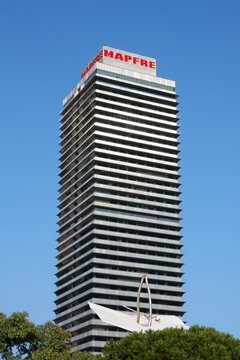 BARCELONA, SPAIN - SEPTEMBER 10, 2009: Torre Mapfre office building in Barcelona, second largest city in Spain. It is owned by Mapfre insurance company.