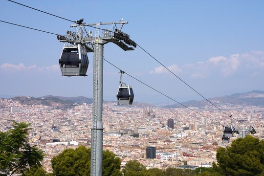BARCELONA, SPAIN - SEPTEMBER 10, 2009: Montjuic Cable Car (Teleferic de Montjuic) and city view in Barcelona, second largest city in Spain.