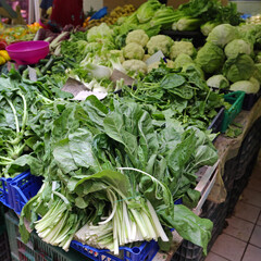 Naklejka premium Leafy Greens Healthy Vegetables at Farmers Market in Rome Italy