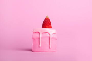 slice of strawberry cake back view isolated on pink background, filling with jam and strawberry...