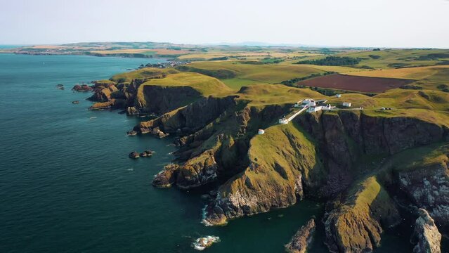 Elevated Views of Scotland Lighthouse and Cliffs: Aerial Beauty at St Abbs Head, Scottish Rugged Shores and Coastal Charm