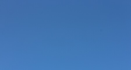 blue sky only no cloud and sunshine. Soft focus blue sky background, copy space horizontal shape - obrazy, fototapety, plakaty