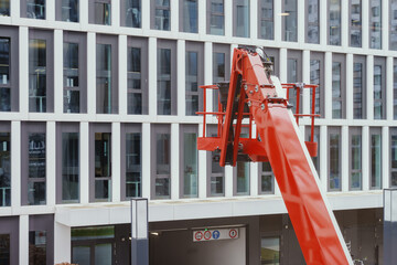 A boom lift is used for work at height. For example, for cleaning or mounting facades