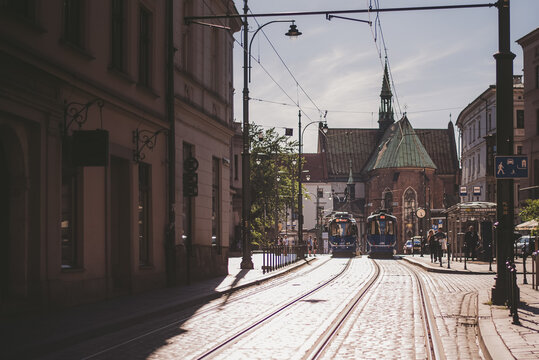 Two trams in a city. 