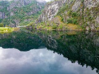 Fototapeta na wymiar Lake with Alpine panorama in Norway
