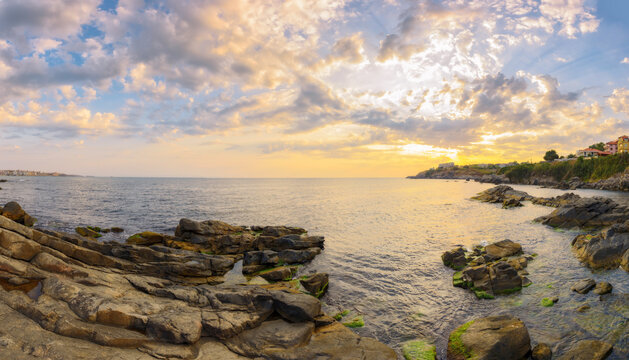 morning scenery with rocky cost of bulgaria black sea near sozopol. fluffy clouds on the sky. relax and leisure concept