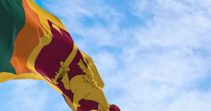 Close-up of Sri Lanka national flag waving on a clear day
