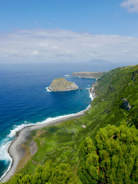 Hiking trail on Flores island connecting Faja Grande and Ponta Delgada, Azores, with view over to islet of Maria Vaz and island of Corvo