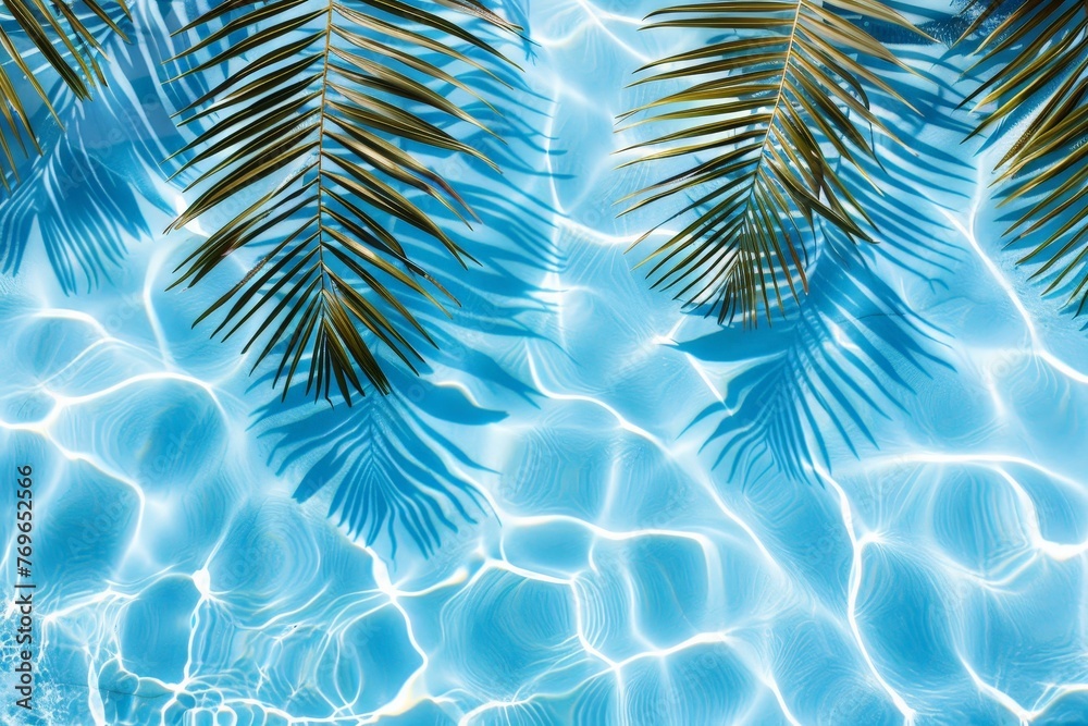 Poster a tranquil pool surrounded by lush palm leaves, creating a serene oasis in the midst of paradise