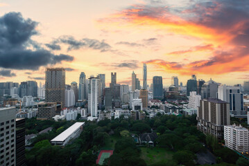 Lumpinee garden and Sathorn building in Bangkok, Thailand