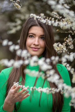 Young Woman in Green Top in the Park