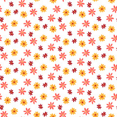 The pattern of spring chamomile flowers. Colored daisies on a white background. Orange, yellow, pink flower with petals. Seamless texture for printing on textiles and paper. Holiday