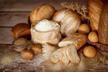 bakery bread assortment. several types of bread in an artistic composition. food-styling of bread.