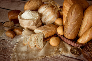 bakery bread assortment. several types of bread in an artistic composition. food-styling of bread.