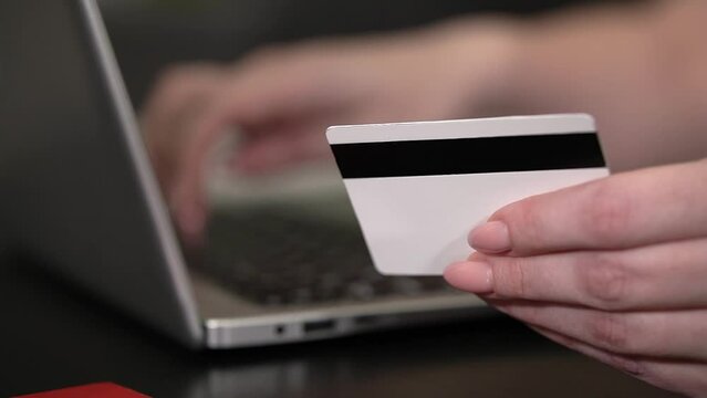 bank card. white bank card. Slow motion video. High quality video in 4K format.