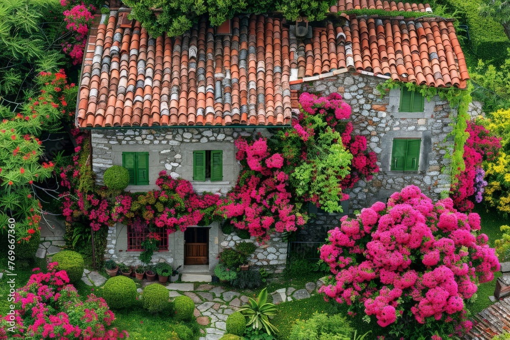 Poster A quaint house with a vibrant array of flowers covering its roof, creating a colorful and whimsical garden oasis in an unexpected location