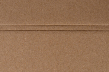 Two crease lines on brown paper