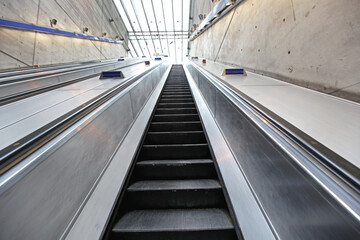Long Escalator Conveyor in Subway Train Station Underground Public Transport