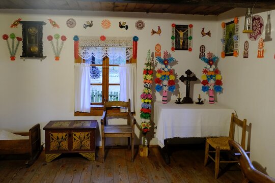 KADZIDLO, MASOVIA, POLAND - March 23, 2024: Interior of cottage with Easter decorations in open-air museum with traditional houses from Kurpie in Kadzidlo, ethnic region in Poland