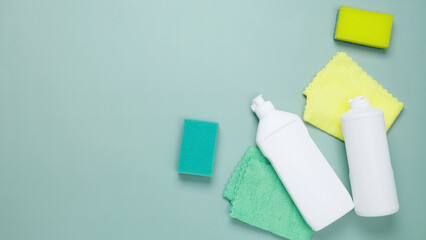 Various accessories cleaning products, sprays, rags, sponges. Top view, flat lay, copy space
