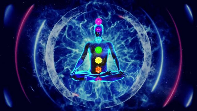Person meditating with visible all chakras.