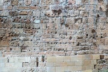 Closeup of an old stone wall of a building