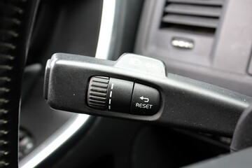 Turn signal lever, adjusting car headlight control switch.