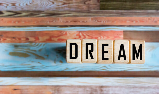 The word Dream written on wooden blocks and vintage background