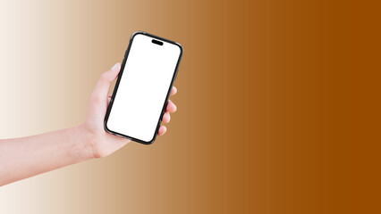 Close-up of hand holding smartphone with blank on screen isolated on background of brown.