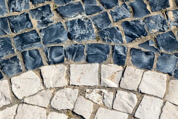 Portuguese paving stones arranged in wave form