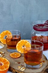 Closeup of an Iced Rooibos mixed with orange peel and lemongrass under the natural light