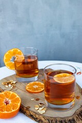Closeup of an Iced Rooibos mixed with orange peel and lemongrass under the natural light