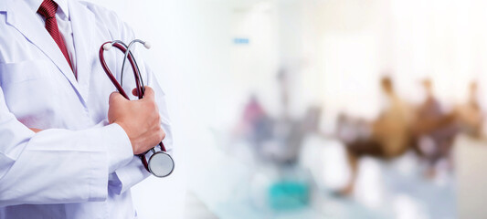 doctor hold stethoscope in hand at hospital with blur people background, healthcare and medical concept - 769727717