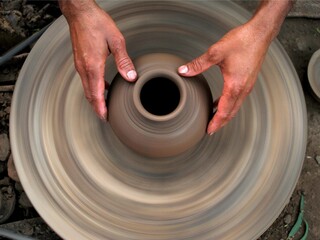 High-angle shot of Manual Claypot Making indicates the cycle of Life, India