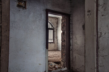 Capture the poignant aftermath of the war with this photo showcasing destroyed old houses in a...