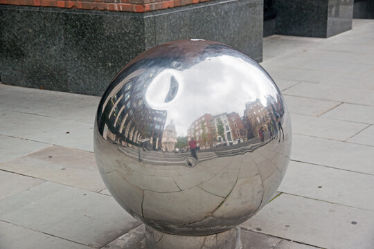 London street reflected in a globe
