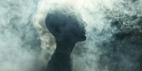 A man's head is shown in a blurry haze of smoke - obrazy, fototapety, plakaty