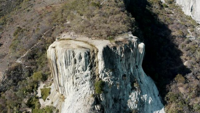 Drone footage landscape over Hierve el Agua rocky range formations in Mexico