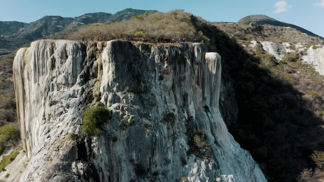 Beautiful drone scene over landscape Hierve el Agua rocky range formations in Mexico
