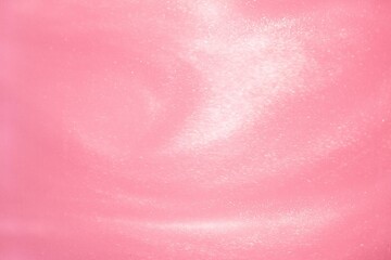 Vibrant pink background with white particles