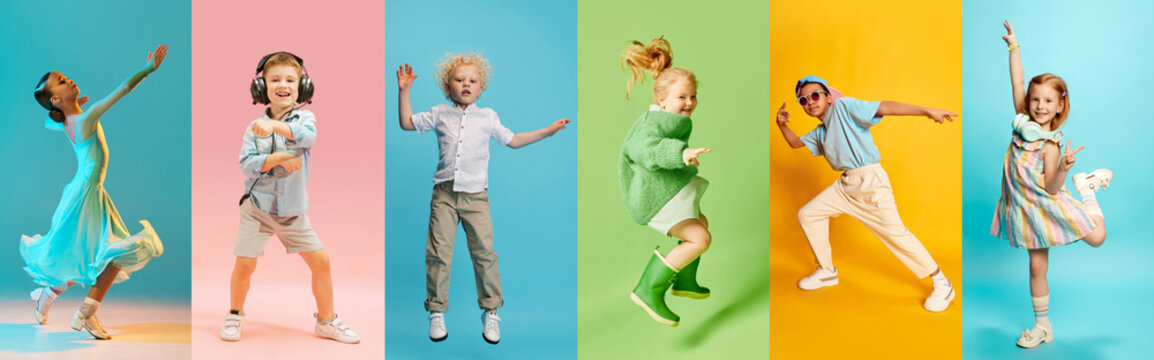 Energetic collage made of dynamic photos of happy, smiling children dancing in motion against pastel colored studio background. Concept of human emotions, childhood, fashion, style, beauty, education