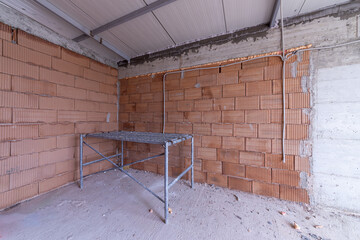 Room is under renovation or under construction. Scaffolding in the office under construction. - 769785173